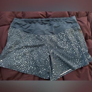 Washed, never worn Oiselle Long Roga Shorts size 12